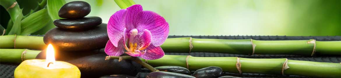 Person with flowers, eyes closed in calm